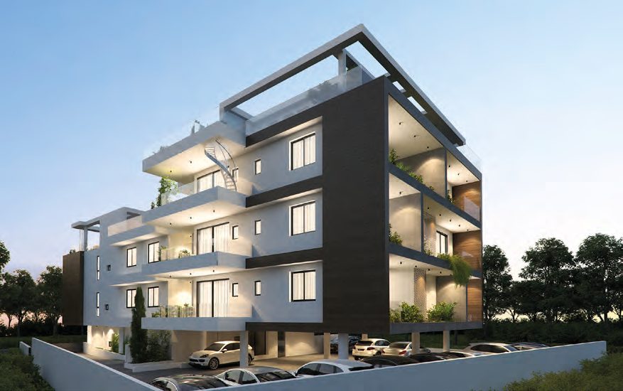 The corner of Aradippou Pearl after dark, warm light behind every window — architect's visualisation